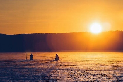 Ice Fishing Adventure in Lapland's Arctic Wilderness in Levi