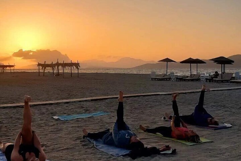 a group doing sunset pilates, all abilities