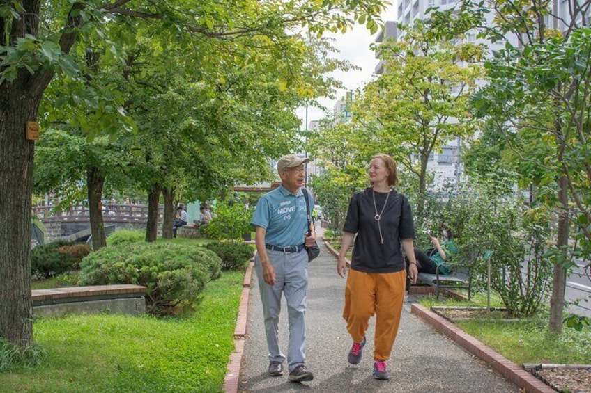 Walk along the river to head to a teahouse.