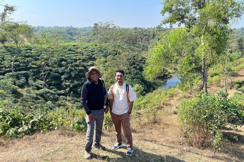 Sri Lankan-Australian guest exploring the scenic tea plantations of Sylhet, Bangladesh — where heritage meets the heart of nature.