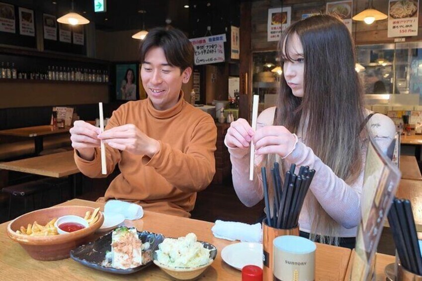Tokyo: Learn the Art of Chopsticks in a Cozy Izakaya!