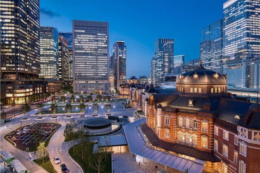 Tokyo Station glowing under the night sky—where history meets modern charm.