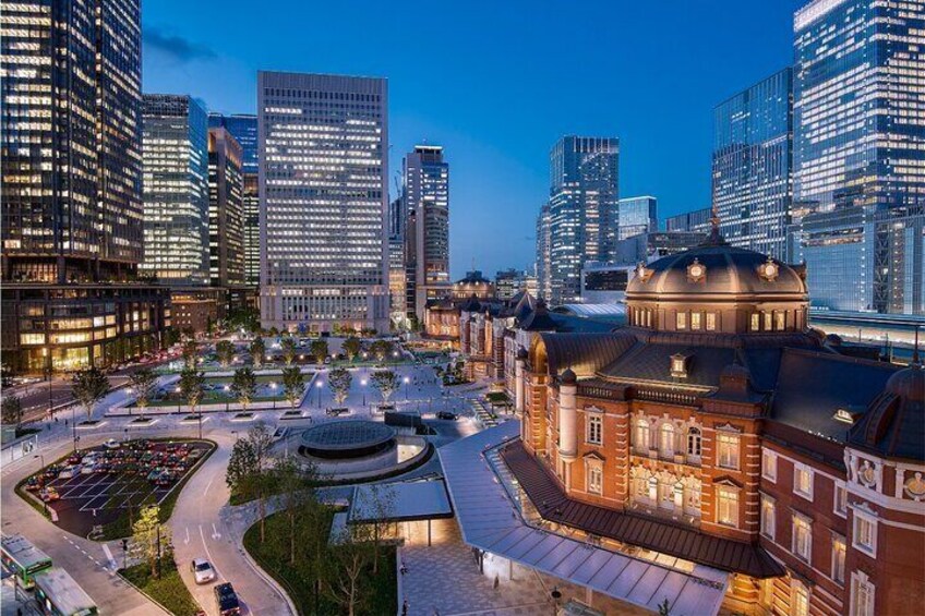 Tokyo Station glowing under the night sky—where history meets modern charm.