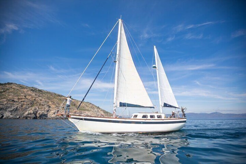 Our sailboat sailing through the Cap de Creus Natural Park