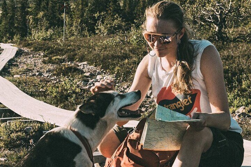 Mountain walk with husky companion
