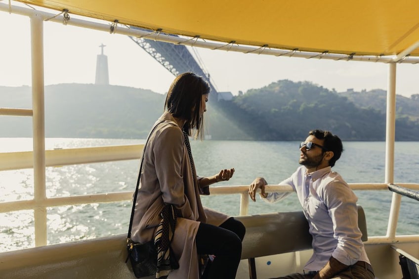 Couple on a boat tour in Lisbon 