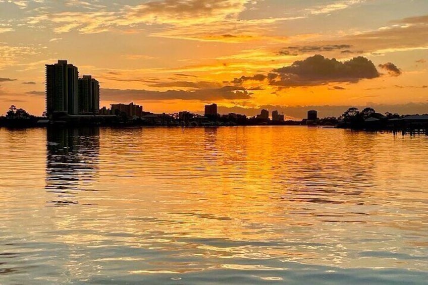 Sun setting on Cotton Bayou as we cruise back into our dock.