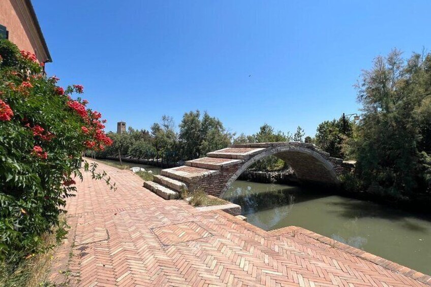 The path leads over old bridges to forgotten worlds
