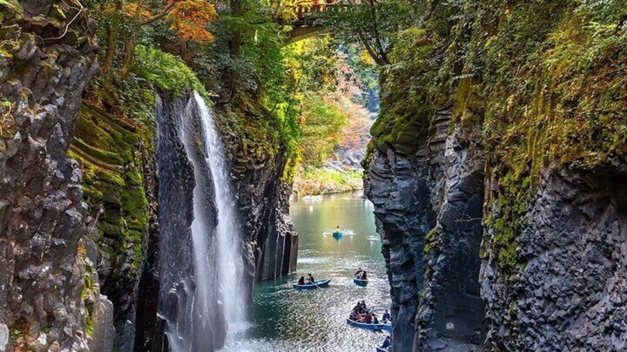 Takachiho Gorge is a V-shaped natural wonder in Miyazaki Prefecture, Kyushu, Japan, formed by Mount Aso's volcanic eruptions, cliffs and the clear Gokase River