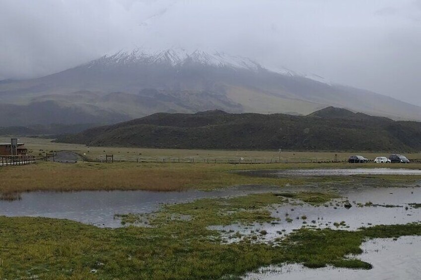 Discover the Mirror-Like Reflections of Cotopaxi in Limpiopungo Lake.