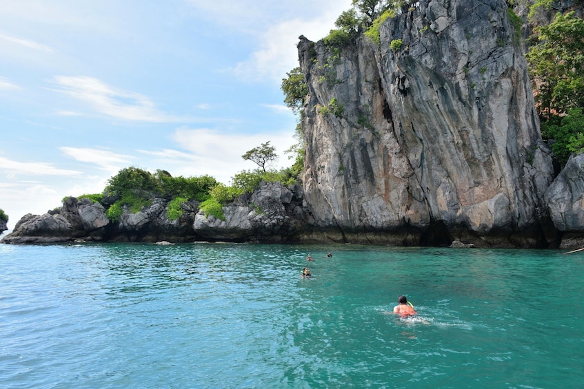 7 Islands Sunset Tour with BBQ Dinner and Night Snorkeling by Longtail Boat