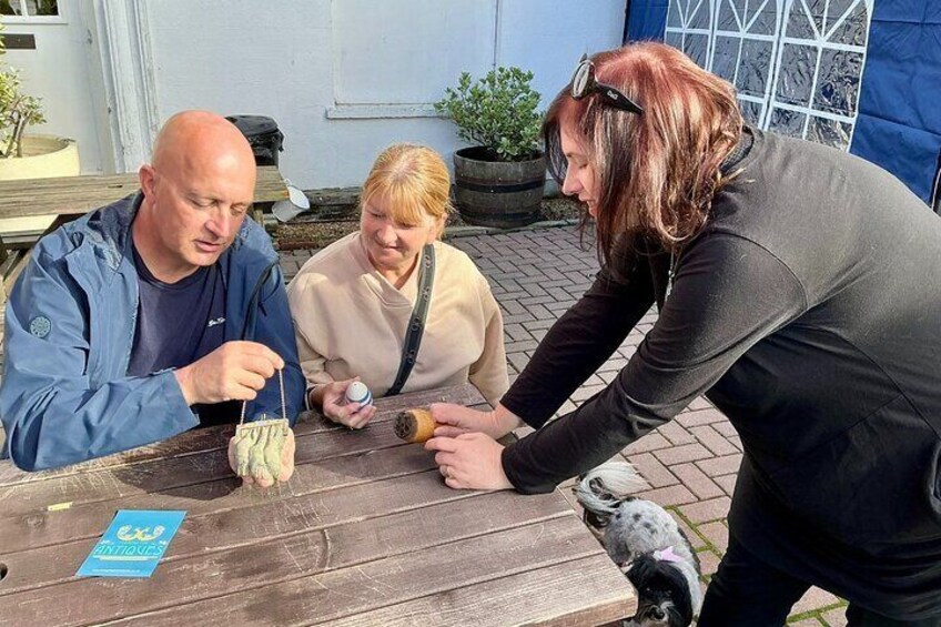 Expert Sarah giving a masterclass in tips when buying antiques