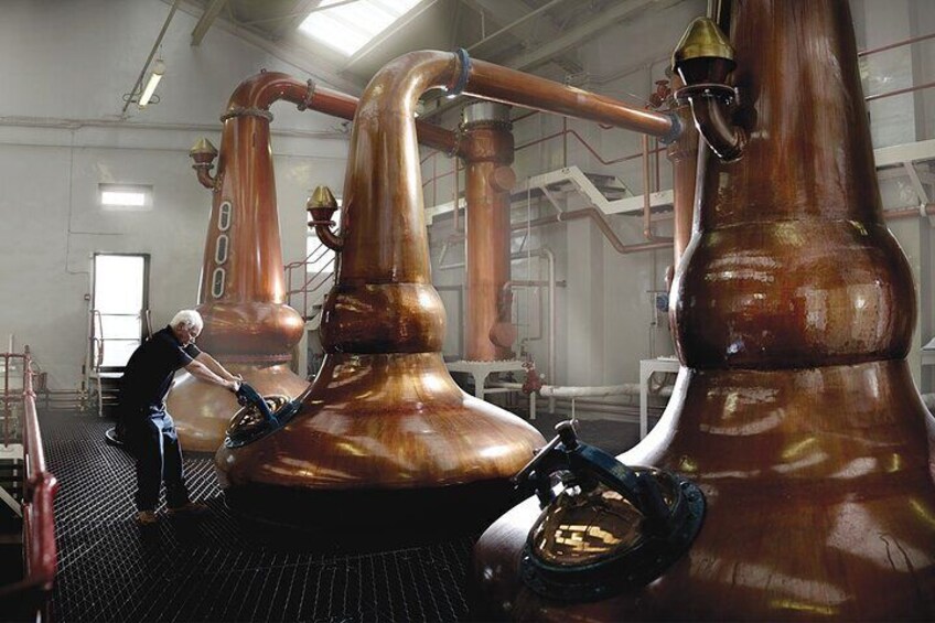 You'll see each stage of whisky production on a guided tour through a working traditional distillery.