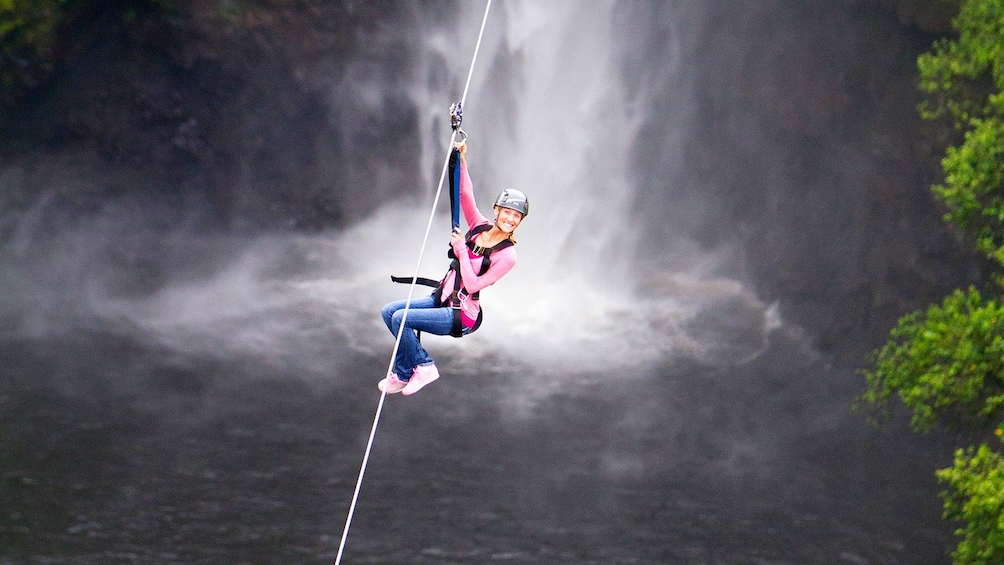 Woman on the Skyline Akaka Falls zipline tour on the Honomu Coast