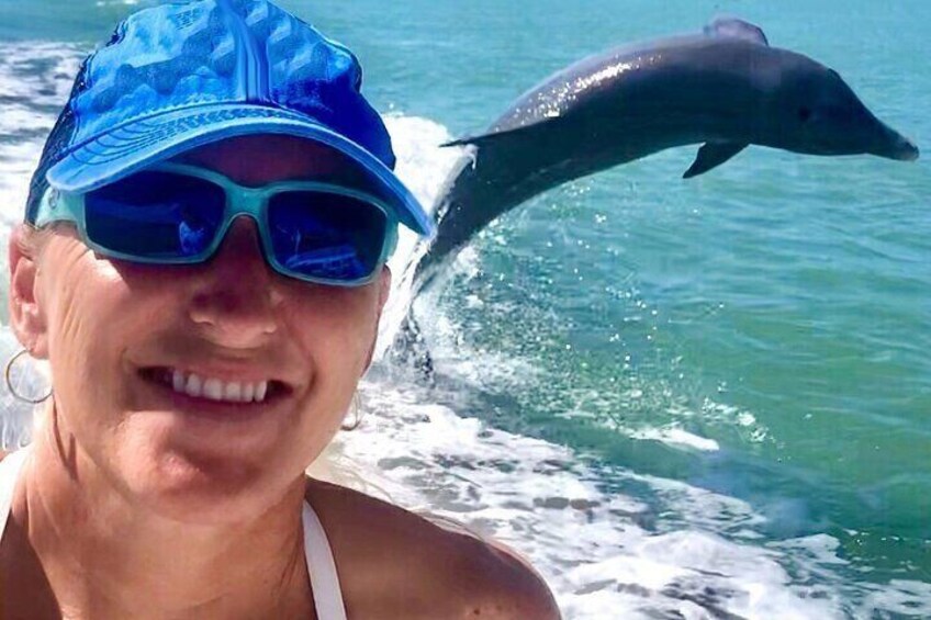 Dolphin photo bomb! What an incredible vacation memory.