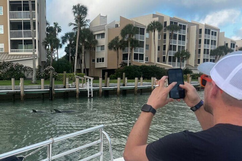 Watch the dolphins as we explore Marco waterfront homes and condos.