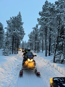 Kiruna: Guided Snowmobile Tour and Swedish Fika Experience