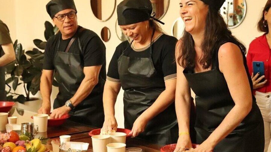 Tourists enjoying the kneading process of pandebons