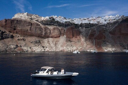 Island hopping (Santorini & Ios)on a private motorboat