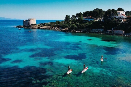 SUP Adventure in Alghero : Tour through the Coves of Lazzaretto