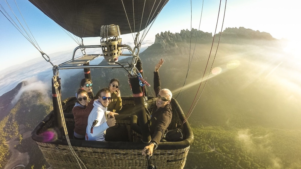 Group of people in a Hot Air Balloon over Montserrat, Spain