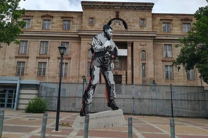 Between Chancellor house, where Nelson Mandela and Oliver Tambo housed their law firm, and the Johannesburg Magistrate's Court stands Marco Cianfanelli's "Shadow Boxer" statue.