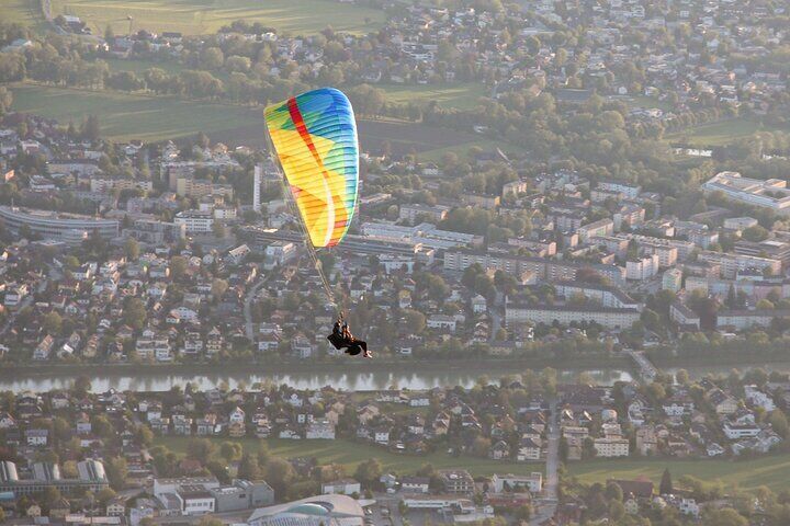 Tandem Paragliding flight above Salzburg city and Salzach river