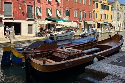 Explore Murano Burano and Torcello in bragozzo island tour