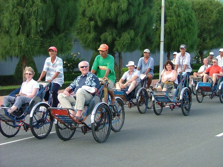 Tour group on a Cyclo Ride in Hanoi city 