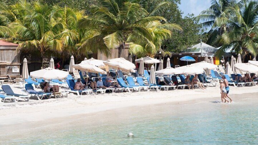 Chillin at the beach in the cool with cold drinks and food