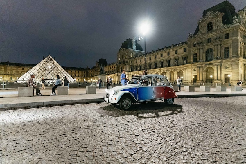 Picture 4 for Activity Paris: Discover Paris by Night in a Vintage Car with a Local