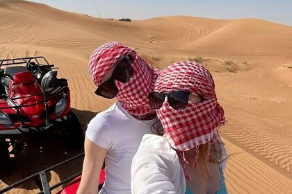 Dubai Desert Safari Dune Bashing Camel Ride Sandboarding and BBQ