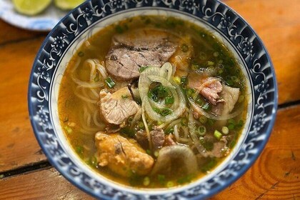 Walking Food Tour in Hue – Traditional Dishes & Hidden Gems