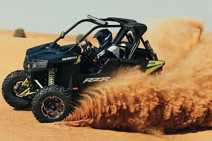 Sunset Desert Adventure with Quad Biking, BBQ, and Live Shows