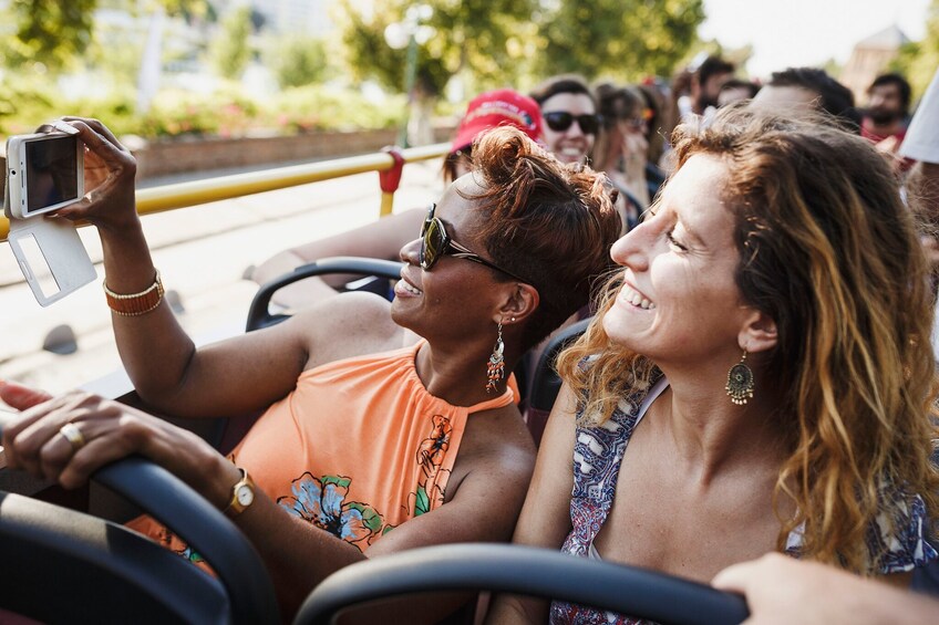 Passengers on a hop-on hop-off bus tour in Seattle