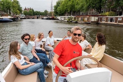 Amsterdam med öppen båt Rundtur i kanalerna med öppen båt med lokal expertg...
