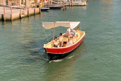 Sunset in a typical boat in Venice