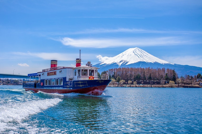 Boat on the water with Mt Fuji in the background