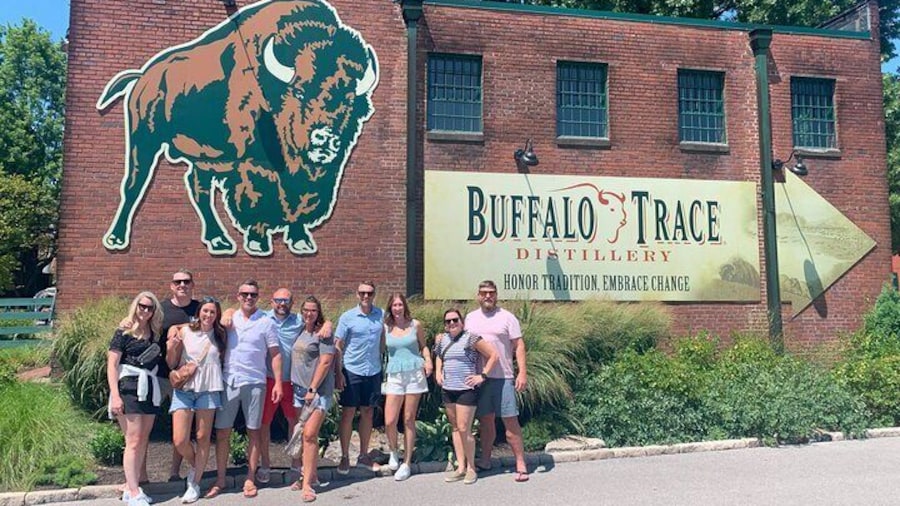Group poses in front of Buffalo Trace Distillery