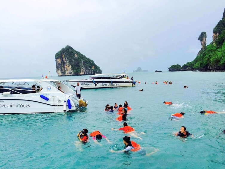 Snorkelers in the waters of Chicken Island, Krabi Province
