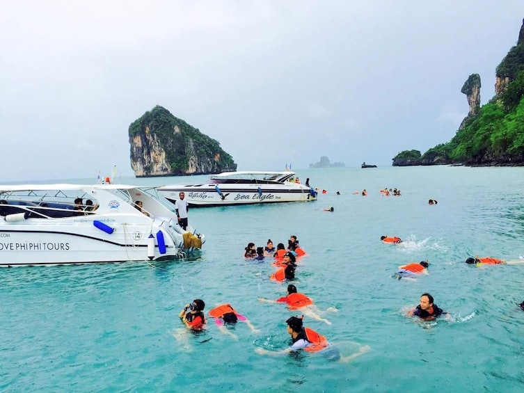 Snorkelers in the waters of Chicken Island, Krabi Province