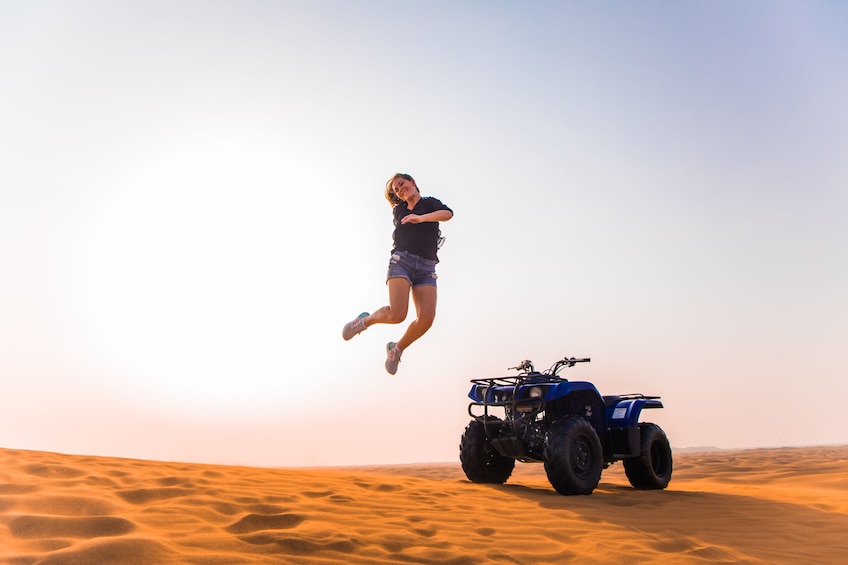 Red Dunes Quad Bike, Sandsurf, Camels & Arabian Buffet Dinner at Al Khayma