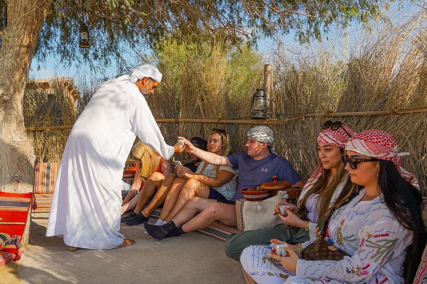 Red Dunes Quad Bike, Sandsurf, Camels & Arabian Buffet Dinner at Al Khayma