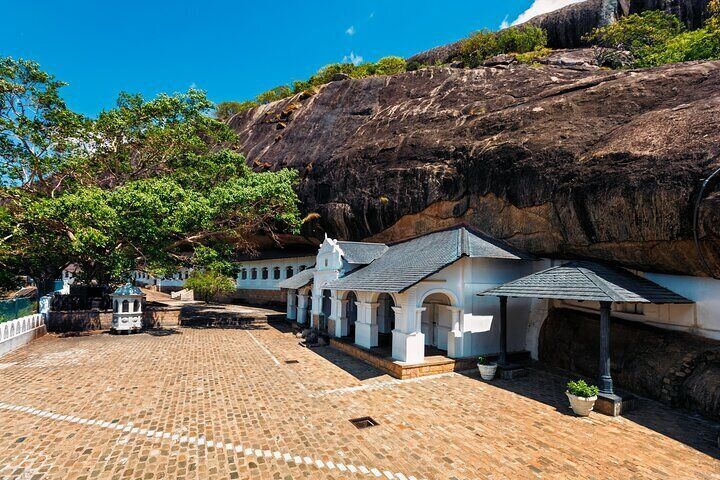 Discover the historic Dambulla Cave Temple, featuring centuries-old Buddha statues, vibrant murals, and panoramic views of the surrounding countryside.