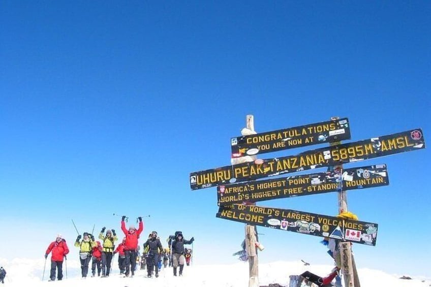 Excitement is in the air. We arrive at UHURU PEAK, with no one else around but your teammates. The euphoria hits as you experience the highest point in Africa.