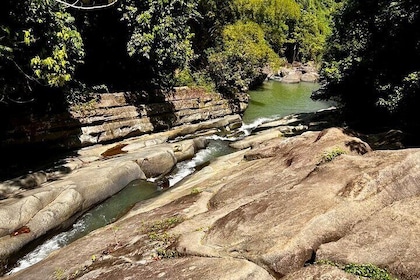 El Yunque Rainforest Waterslides Transport from San Juan