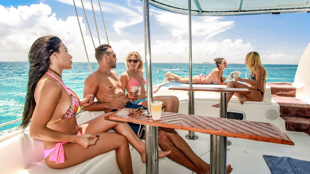 Luxury Catamaran Sail to Isla Mujeres with Beach Club