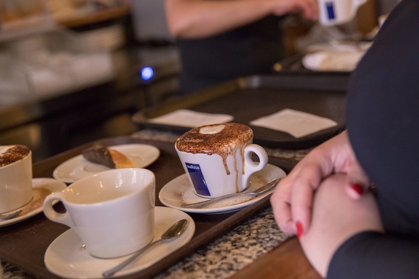 Show item 4 of 10. Cappuccino at a cafe in Boston