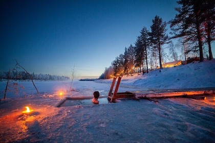 Private Snowmobile Safari with Riverside Sauna