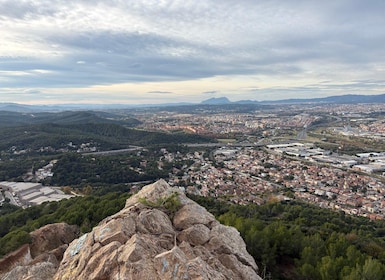 From Barcelona: Hiking on a hill with panoramic views